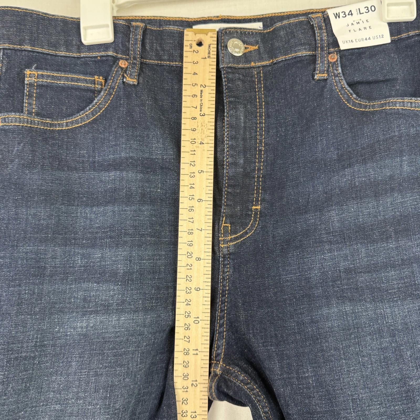 Topshop Jeans Size 12 Womens Jamie Flare Stretch Dark Wash Raw Hem
